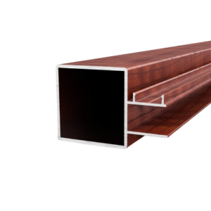 A close-up of a long, rectangular, brown hollow metal beam with an open end facing the viewer. The beam, resembling an aluminium framing post 50 x 50 in western red cedar color, has an additional smaller section attached inside near the opening.